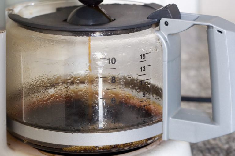 A coffee maker brewing coffee.