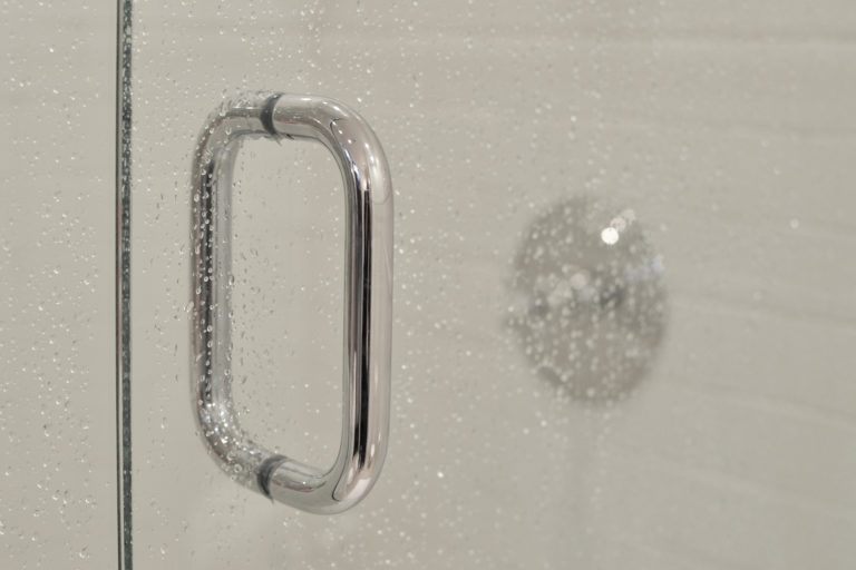 A glass shower door.