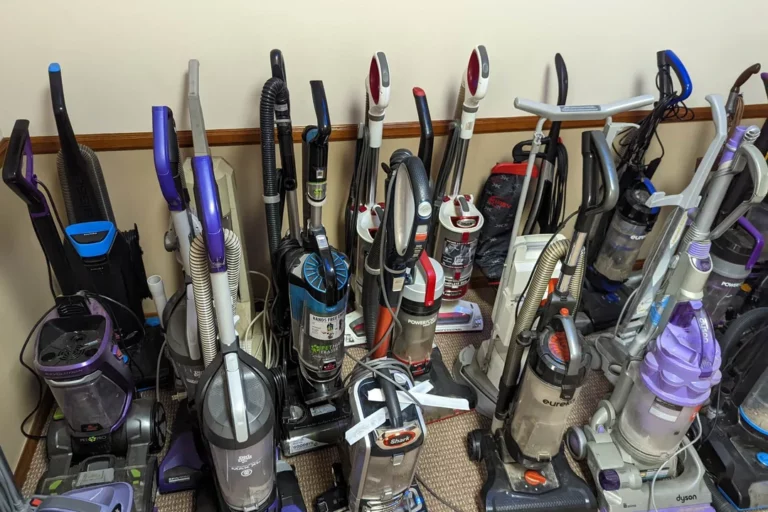 A photo of a dozen vacuums that look like they should be cleaned